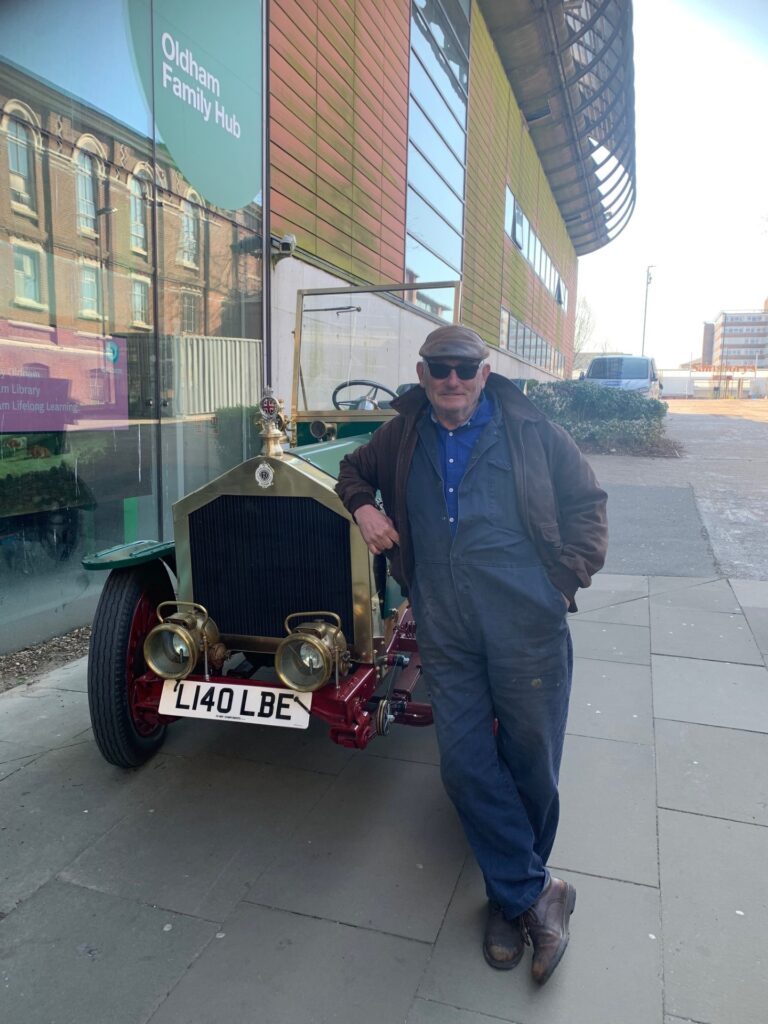 Frank Rothwell with his replica of The Eclipse Machine Company’s 1910 model car. Credit: Gallery Oldham